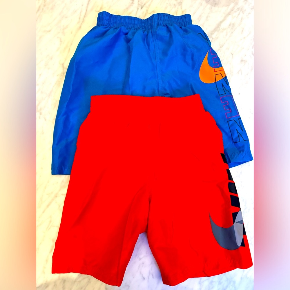 Two pairs of Nike swimtrunks size small. Fits 6-8 boys.